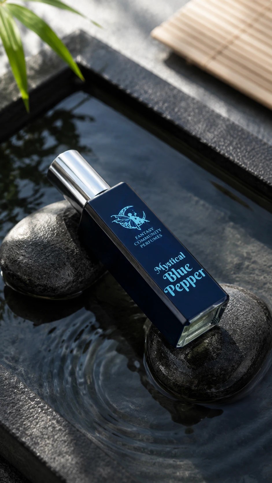 Mystical Blue Pepper Extrait de Parfum bottle in hand — compact 30 ml icy fougère fragrance